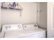 A functional laundry room featuring a white washer and dryer set at 520 Arrowhead Trl # 522, Henderson, NV 89015