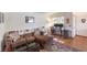 Inviting living room featuring a comfortable couch and a dedicated workspace with a desk at 520 Arrowhead Trl # 522, Henderson, NV 89015