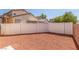 Wide shot of a fully fenced backyard, providing privacy and a safe outdoor space at 5402 Shady Lair Ct, North Las Vegas, NV 89031