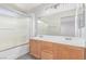 A bathroom featuring double sinks and a shower at 5402 Shady Lair Ct, North Las Vegas, NV 89031