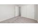 This is a bedroom with carpet and closet space at 5402 Shady Lair Ct, North Las Vegas, NV 89031