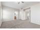 This is a spacious bedroom with neutral paint and carpet at 5402 Shady Lair Ct, North Las Vegas, NV 89031