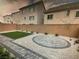 The backyard boasts a patio and low-maintenance landscaping at 5888 Becklow Gardens Ave, Las Vegas, NV 89141