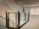 Modern staircase with sleek metal railings, leading to the upper level of the home at 5888 Becklow Gardens Ave, Las Vegas, NV 89141