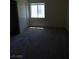 This bedroom features a window for natural light and a large closet with sliding doors at 5969 High Steed St # 101, Henderson, NV 89011