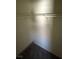 An empty closet with a shelf and rod for hanging clothing and storing personal items at 5969 High Steed St # 101, Henderson, NV 89011