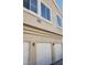 Close-up of exterior showing the unit number and the three-car garage at 5969 High Steed St # 101, Henderson, NV 89011