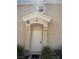 Entrance of townhome featuring unit number above a white front door at 5969 High Steed St # 101, Henderson, NV 89011