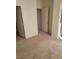 Interior view with open doorways and carpeted floors throughout at 5969 High Steed St # 101, Henderson, NV 89011