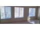 Bright living space with ample windows offering plenty of natural light at 5969 High Steed St # 101, Henderson, NV 89011