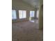 Bright living room with large windows for lots of natural light at 5969 High Steed St # 101, Henderson, NV 89011