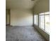 Spacious living room with lots of natural light from many windows at 5969 High Steed St # 101, Henderson, NV 89011