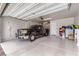 Clean, spacious garage with epoxy flooring and ample storage space at 6519 Summershade St, North Las Vegas, NV 89086