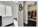 Beautiful bathroom showcasing a tiled shower with bench and a doorway leading to a walk-in closet at 6647 Montezuma Castle Ln, North Las Vegas, NV 89084