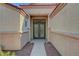 Close-up of the entry showcasing the decorative wrought iron double front doors at 6647 Montezuma Castle Ln, North Las Vegas, NV 89084