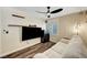 Cozy living room area with a comfortable sofa, and shelving, perfect for relaxation and entertainment at 6647 Montezuma Castle Ln, North Las Vegas, NV 89084