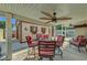 Covered patio with ample seating, offering a perfect space for relaxation and outdoor enjoyment at 6647 Montezuma Castle Ln, North Las Vegas, NV 89084