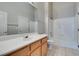 Bathroom features double sinks and tiled shower at 700 Carnegie St # 122, Henderson, NV 89052