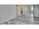 This bedroom features wood-look flooring and a mirrored closet at 700 Carnegie St # 122, Henderson, NV 89052