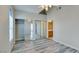 Bedroom features wood-look flooring and vaulted ceiling at 700 Carnegie St # 122, Henderson, NV 89052