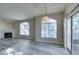 The living room boasts a fireplace and a sliding door leading to a balcony at 700 Carnegie St # 122, Henderson, NV 89052