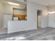 Open floor plan features grey floors, kitchen view, and ample natural light at 700 Carnegie St # 122, Henderson, NV 89052
