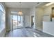 Light-filled living area with sliding glass doors and view of the balcony at 700 Carnegie St # 122, Henderson, NV 89052