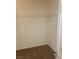 Walk-in closet with white wire shelving providing ample storage space at 7112 Whitford St, Las Vegas, NV 89166