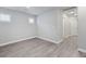 Bonus room with wood-look flooring, white trim, and recessed lighting at 7432 Red Plumeria Ave, Las Vegas, NV 89113