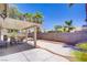 Backyard featuring desert landscaping, a covered patio, and outdoor furniture at 7713 White Grass Ave, Las Vegas, NV 89131