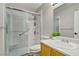 Bathroom featuring glass shower, modern fixtures, and a spacious layout at 7713 White Grass Ave, Las Vegas, NV 89131