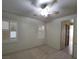 Bedroom with natural light, shuttered windows, and closet access to bathroom at 7728 Villa De La Paz Ave, Las Vegas, NV 89131