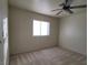 Neutral bedroom featuring carpet and a window with plantation shutters at 7728 Villa De La Paz Ave, Las Vegas, NV 89131