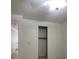 Bedroom featuring a closet with sliding doors at 7728 Villa De La Paz Ave, Las Vegas, NV 89131