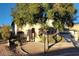 Charming two-story home with a well-manicured front yard and attached garage at 7728 Villa De La Paz Ave, Las Vegas, NV 89131