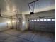 Garage with two car spaces and automatic doors at 7728 Villa De La Paz Ave, Las Vegas, NV 89131