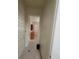 Bright hallway featuring tile floors and access to other rooms at 7728 Villa De La Paz Ave, Las Vegas, NV 89131
