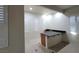 Kitchenette area with island, sink, and granite countertop at 7728 Villa De La Paz Ave, Las Vegas, NV 89131