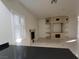 Open-concept living room featuring sleek countertops and ample natural light at 7728 Villa De La Paz Ave, Las Vegas, NV 89131