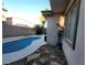 A sparkling pool with a stone patio, offering a refreshing retreat and a great place to relax outdoors at 7728 Villa De La Paz Ave, Las Vegas, NV 89131