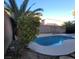 This private pool features a refreshing swimming space, palm trees and offers ultimate relaxation at 7728 Villa De La Paz Ave, Las Vegas, NV 89131