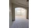 View of room with arched ceiling and plantation shutters at 7728 Villa De La Paz Ave, Las Vegas, NV 89131