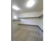 Spacious walk-in closet with carpet, clothing racks, and natural light at 7728 Villa De La Paz Ave, Las Vegas, NV 89131