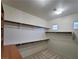 Bright walk-in closet with shelving, clothing rods, and patterned carpet at 7728 Villa De La Paz Ave, Las Vegas, NV 89131