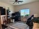 Comfortable bedroom with a large window, a work space, and relaxing decor at 790 Fort Churchill Rd, Pahrump, NV 89060