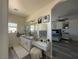 Main bathroom featuring a double vanity, and a separate makeup area with stylish decor at 790 Fort Churchill Rd, Pahrump, NV 89060