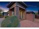 Welcoming front porch with stone accents and desert landscaping at 8 Reflection Cove Dr, Henderson, NV 89011