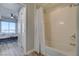Cozy bathroom features a shower over tub and neutral decor at 8255 Las Vegas S Blvd # 1414, Las Vegas, NV 89123
