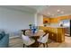 Well-lit dining area adjacent to the kitchen with seating for four at 8255 Las Vegas S Blvd # 1414, Las Vegas, NV 89123