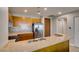 Bright kitchen features stainless steel appliances and granite countertops at 8255 Las Vegas S Blvd # 1414, Las Vegas, NV 89123